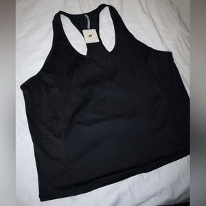 New with tags black fabletics razor back tank top. Size: XXL/ 1xl